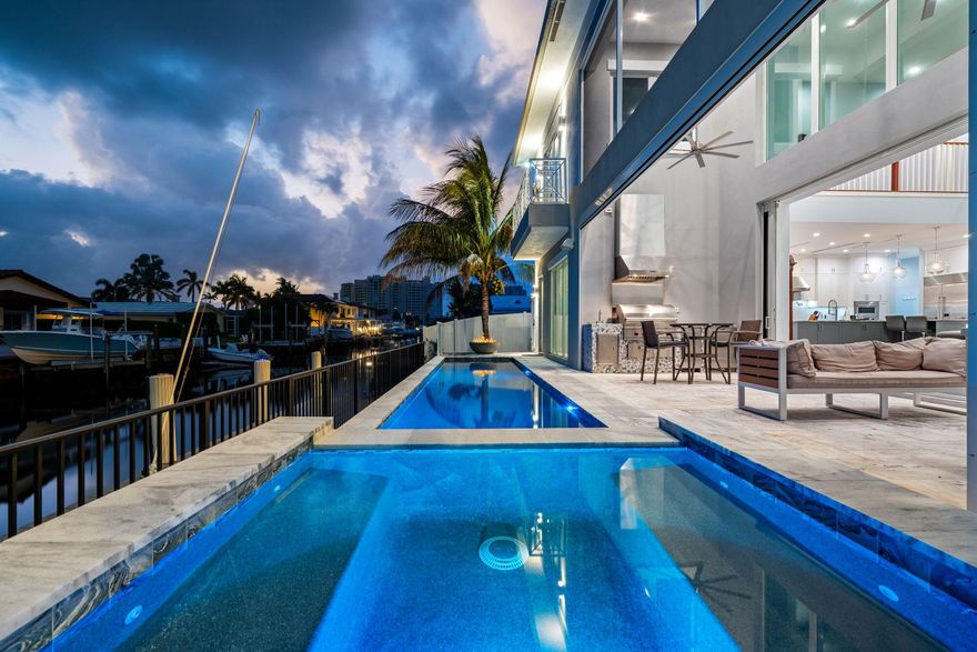 Welcome to 807 Dover Street, a 2021 custom-built classic-contemporary estate in Boca Raton's exclusive Bel Marra on 85+/- feet of waterfrontage with a full-service dock offering direct no-fixed-bridges ocean access. Delivering an exceptional indoor/outdoor lifestyle with a resort-style pool and spa, the light-filled principal rooms are defined by high ceilings, premium finishes and retractable impact-glass sliding doors that open to the water-view poolside lanai, complete with a fully equipped summer kitchen. Entertain with ease in the chef's kitchen, featuring professional-grade appliances that include a Wolf six-burner dual-fuel range, and complemented by a dedicated wine room.  The luxe first-floor primary suite offers serene water views, while upstairs, in addition to three guest bedrooms, is a VIP suite with a water-view balcony. For added conveniences are an elevator, laundry rooms on each floor, and a three-car garage with two lifts, and full natural gas service.     DISCLAIMER: Information published or otherwise provided by the listing company and its representatives including but not limited to prices, measurements, square footages, lot sizes, calculations, statistics, and videos are deemed reliable but are not guaranteed and are subject to errors, omissions or changes without notice. All such information should be independently verified by any prospective purchaser or seller. Parties should perform their own due diligence to verify such information prior to a sale or listing. Listing company expressly disclaims any warranty or representation regarding such information. Prices published are either list price, sold price, and/or last asking price. The listing company participates in the Multiple Listing Service and IDX. The properties published as listed and sold are not necessarily exclusive to listing company and may be listed or have sold with other members of the Multiple Listing Service. Transactions where listing company represented both buyers and sellers are calculated as two sales. "No payments made until title passes" Some affiliations may not be applicable to certain geographic areas. If your property is currently listed with another broker, please disregard any solicitation for services. Information published or otherwise provided by seller, listing company or its representatives is deemed reliable but are not guaranteed and subject to errors, omissions, or changes without notice. Copyright 2026 by the listing company. All Rights Reserved.