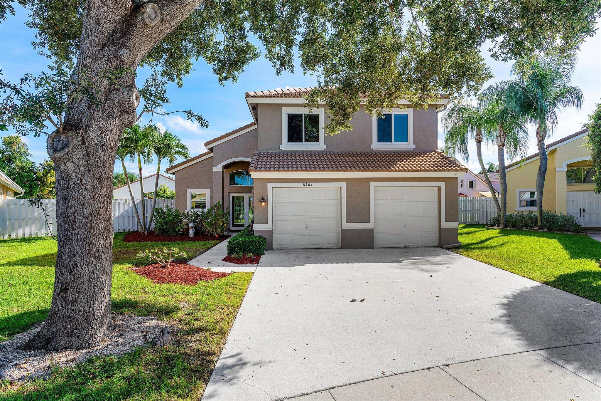 Located on a quiet cul-de-sac in a prestigious, non-membership gated golf community and within a top-rated A-rated school zone, this beautifully updated home offers luxury, comfort, and endless potential. This 3 bedroom (loft can be converted to 4th bedroom- see floor plan), 2.5 bathroom home features a new kitchen with an abundance of cabinetry and storage, stunningly renovated bathrooms, and new flooring throughout the lower level. Hurricane-impact windows and doors provide both peace of mind and energy efficiency. The expansive backyard is a true highlight--an open canvas for a resort-style pool, private putting green, or custom batting cage for the ultimate sports enthusiast. This is more than a home--it's your future sanctuary. Located just minutes from shopping, restaurants, highways