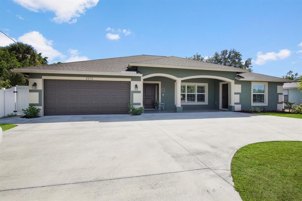 Photo of 2313 SW Savona Boulevard, Port St Lucie, FL 34953 (MLS # R10876162)