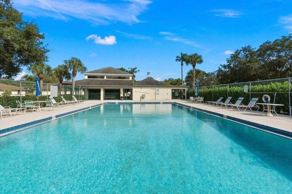 Photo of 1331 Peppertree Trail #C, Fort Pierce, FL 34950 (MLS # R11167118)