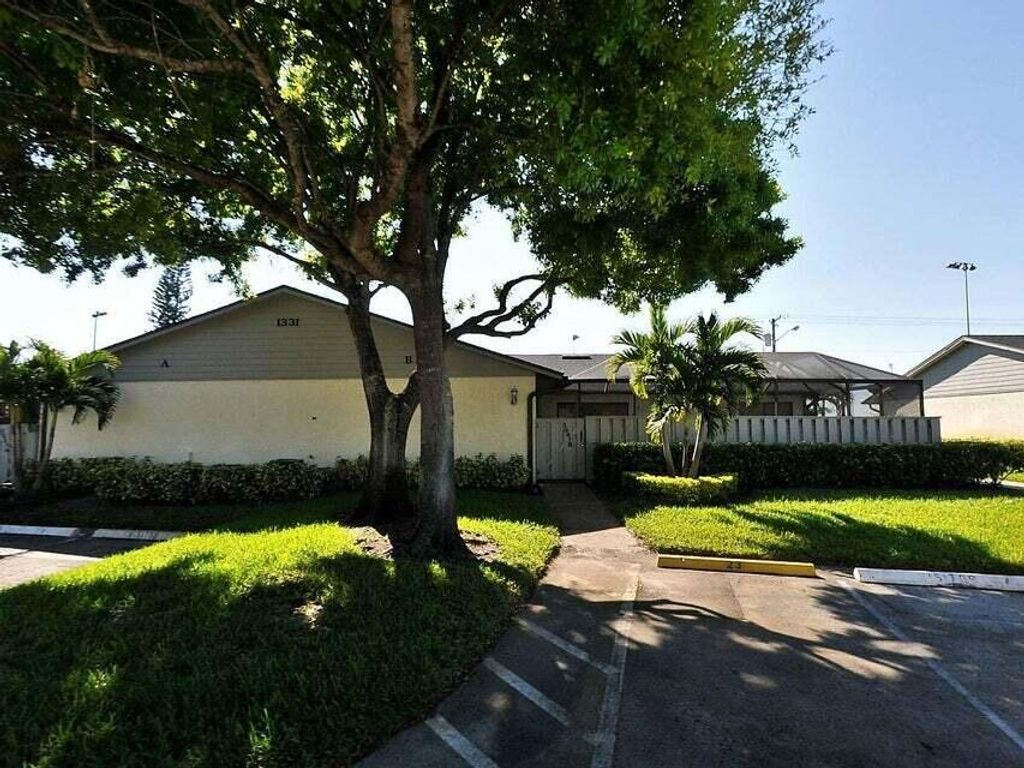 Photo of 1331 Peppertree Trail #C, Fort Pierce, FL 34950 (MLS # R11167118)