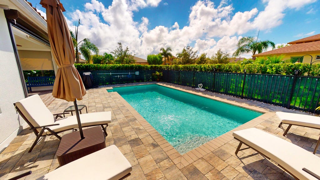 Photo of 9617 SW Royal Poinciana Drive, Port Saint Lucie, FL 34987 (MLS # R11120568)