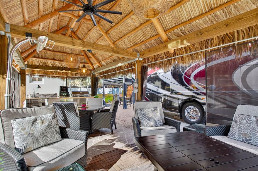 Bring your CLASS A motor coach and embrace the ultimate South Florida lifestyle! Aztec RV Resort, an exclusive ALL-AGE, MAN-GATED RV COMMUNITY, is situated near Fort Lauderdale Airport, pristine beaches, world-class dining, shopping, and entertainment. This stunning parcel offers the perfect blend of comfort and luxury. Enjoy a beautiful TIKI completed in 2022 with KITCHEN, DINING AREA, and a FAMILY ROOM—perfect for entertaining or unwinding. For added convenience, the property features a CASITA, designed with a kitchenette, bathroom and a MURPHY BED. When it comes to recreation, the activities are endless! Engage in PICKLEBALL TOURNAMENTS, socialize at HAPPY HOURS, or enjoy the TENNIS/PICKLEBALL COURTS. Don’t miss your chance to enjoy this incredible lifestyle where luxury meets adventure