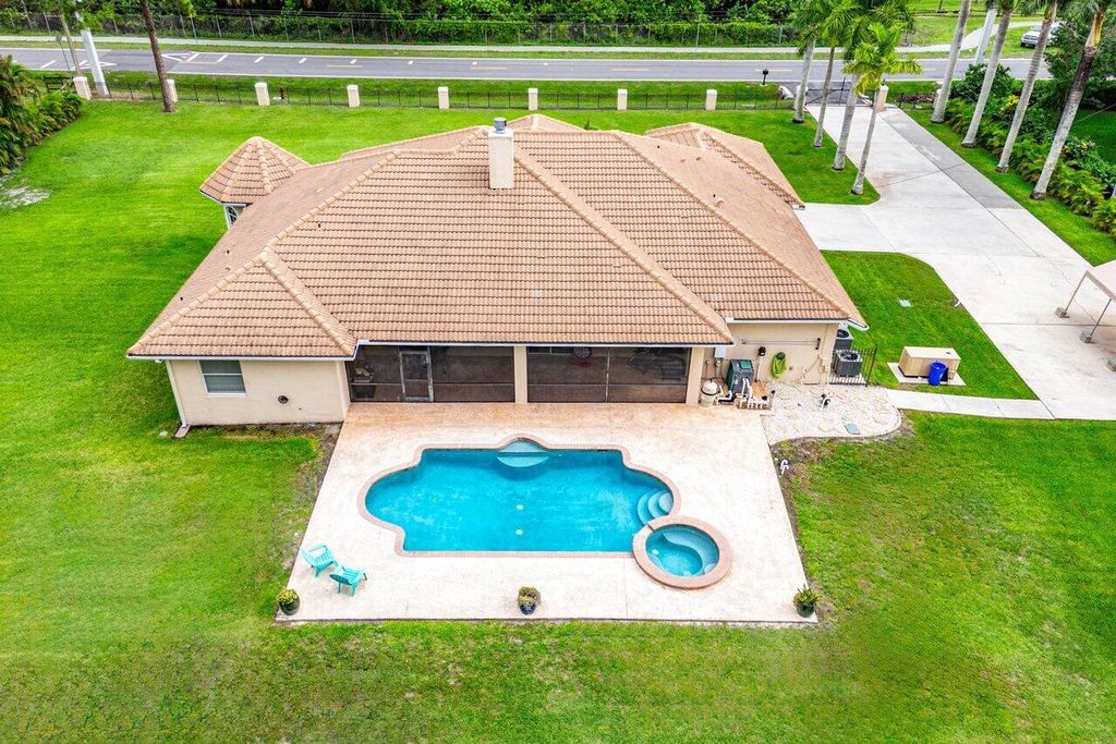 Photo of 18301 Hamlin Boulevard, The Acreage, FL 33470 (MLS # R11097443)