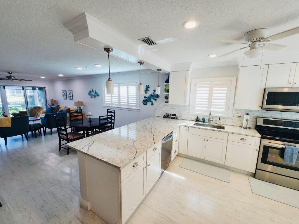 Photo of 1866 SW Palm City Road #107, Stuart, FL 34994 (MLS # R11158960)