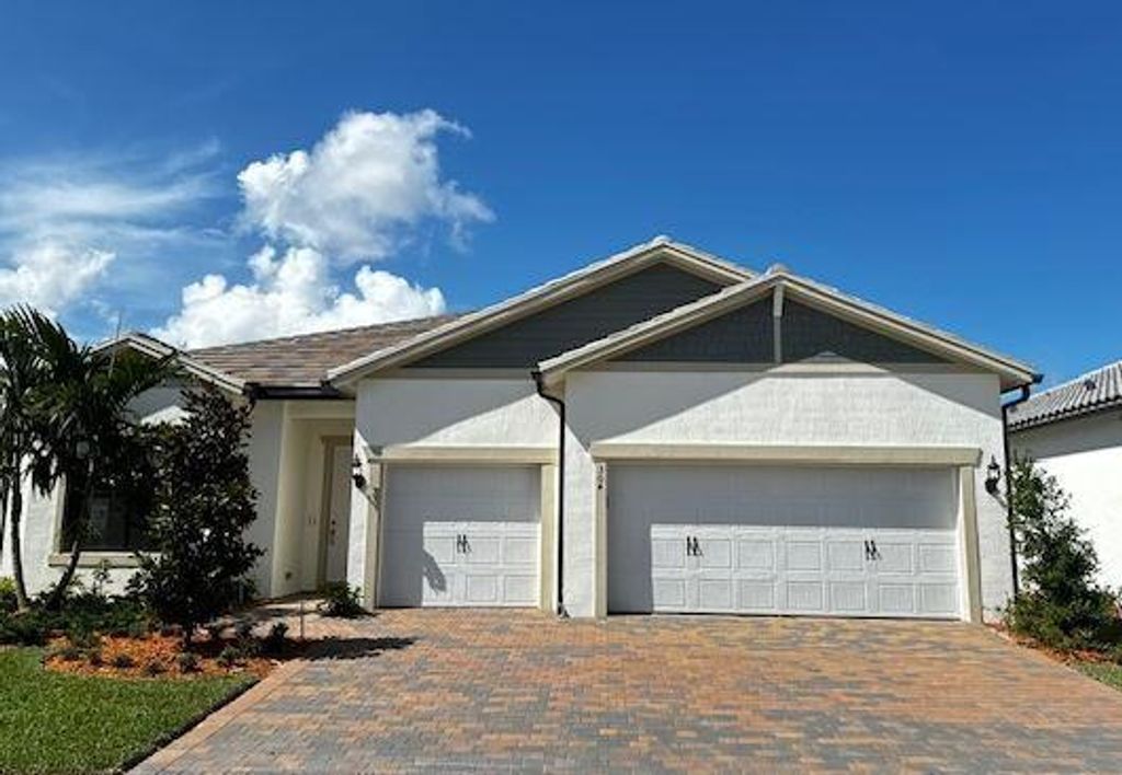 Photo of 304 SE Filoli Drive, Port Saint Lucie, FL 34984 (MLS # R11002524)