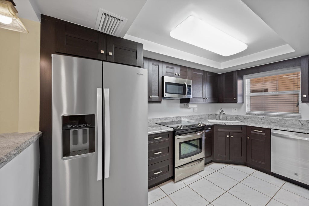 Photo of 725 N RIVERSIDE Drive #203, Pompano Beach, FL 33062 (MLS # B26067659)