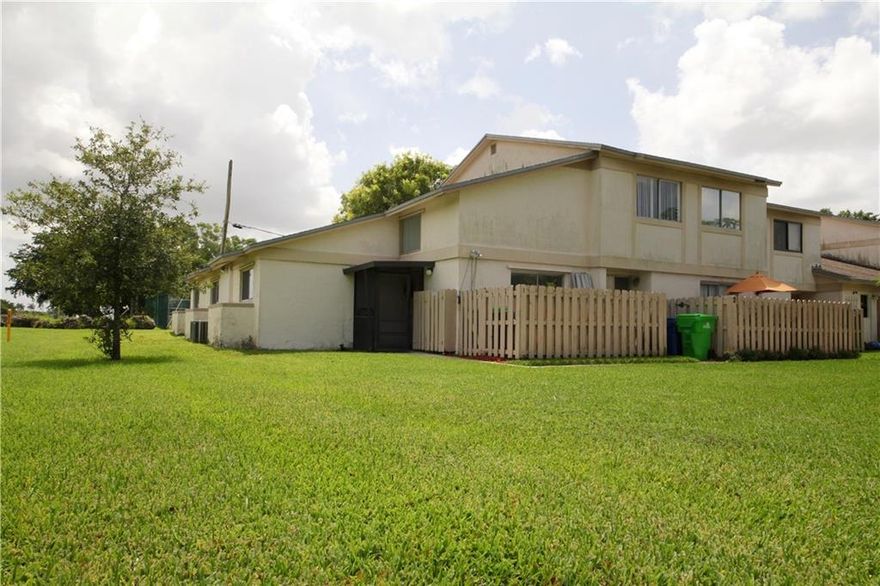 Waterfront corner unit priced just right! 3/2  Townhouse with lots of natural lighting over looking the canal. Fishing is allowed with a Florida Licence.  Tile flooring throughout.  Located close to The Sawgrass Mills Mall and the Sawgrass Express Way.  The complex features a clubhouse with a pool,  This home will not last.