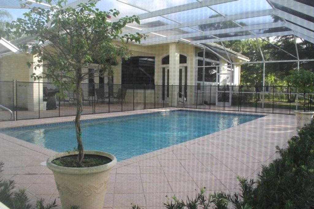 Photo of 8279 Steeplechase Drive, Palm Beach Gardens, FL 33418 (MLS # R10288778)