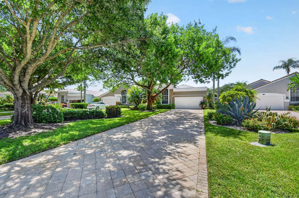 Photo of 4758 CARLTON GOLF Drive, Lake Worth, FL 33449 (MLS # B26066462)