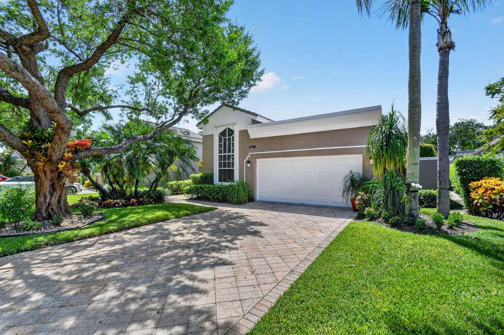 Photo of 4758 CARLTON GOLF Drive, Lake Worth, FL 33449 (MLS # B26066462)