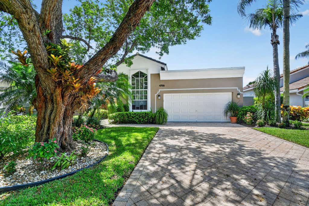 Photo of 4758 CARLTON GOLF Drive, Lake Worth, FL 33449 (MLS # B26066462)