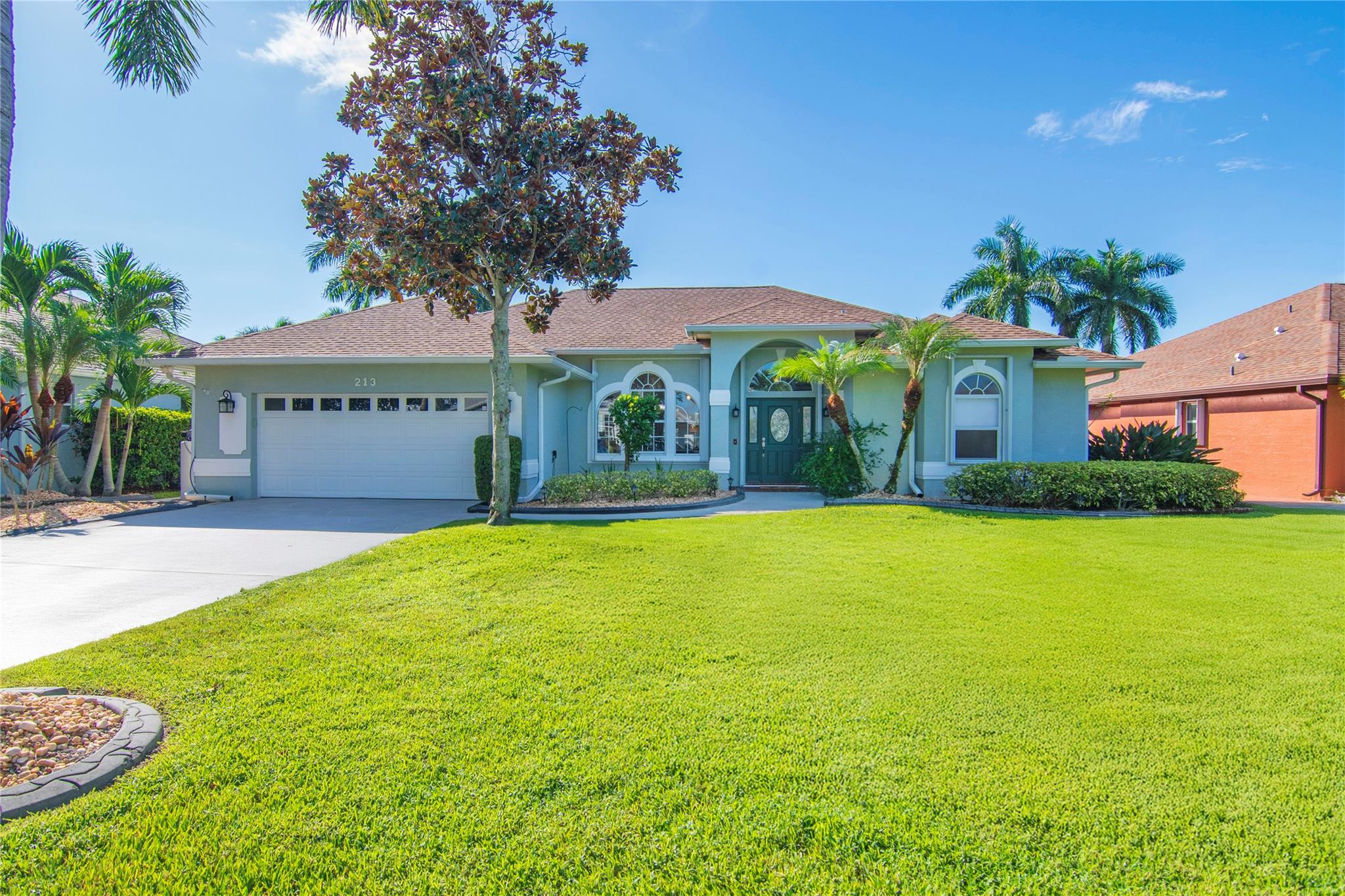 This 2001 lakefront pool home is a rare find—four bedrooms, two bathrooms, and sparkling water views from nearly every room. Bright, open living spaces flow seamlessly to a screened pool deck, where solar heating lets you swim year-round against a backdrop of shimmering lake sunsets. The whole-house solar keeps energy costs low. With furniture negotiable, you can move right in or make it your own. A perfect blend of style, sustainability, and everyday luxury, this home invites you to embrace lakefront living at its finest. Room and pool sizes are approx