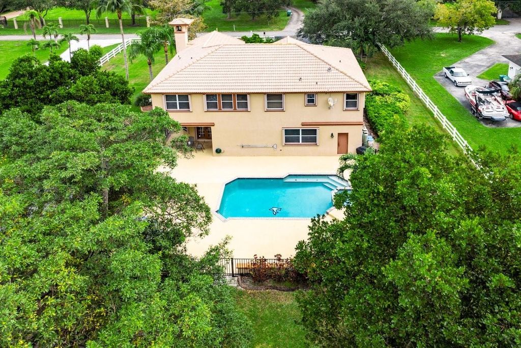 Photo of 5811 NW 80th Terrace, Parkland, FL 33067 (MLS # F10469829)