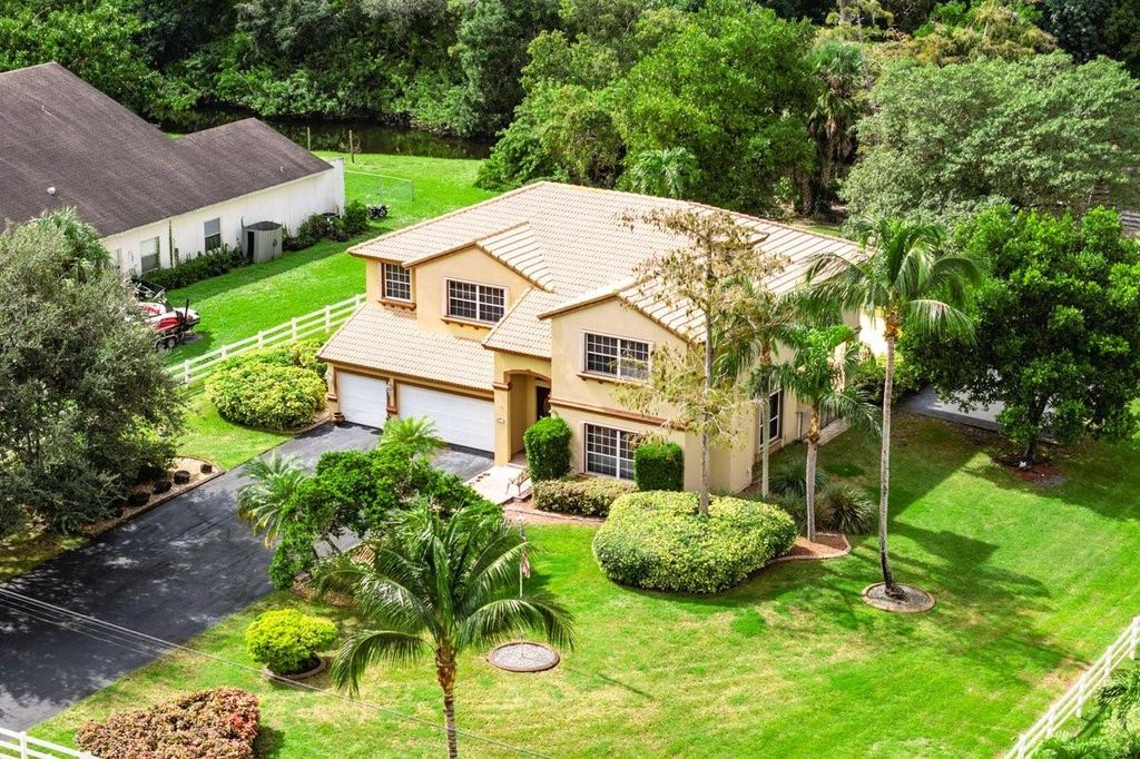 Photo of 5811 NW 80th Terrace, Parkland, FL 33067 (MLS # F10469829)