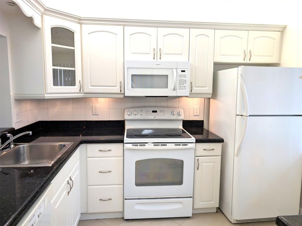 Photo of 6550 Somerset Drive #105, Boca Raton, FL 33433 (MLS # F10512282)