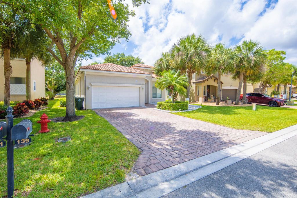 Photo of 139 Two Pine Drive, Greenacres, FL 33413 (MLS # R11090990)