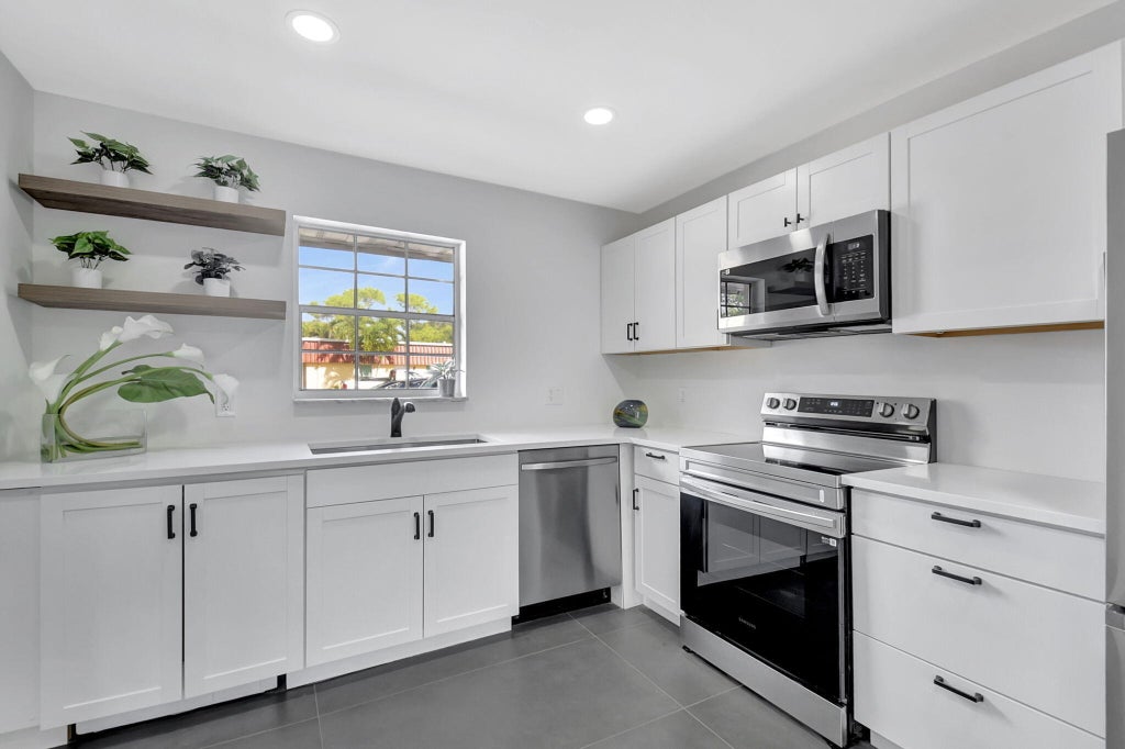 Photo of 868 Worcester Lane #B, Lake Worth, FL 33467 (MLS # B26052802)