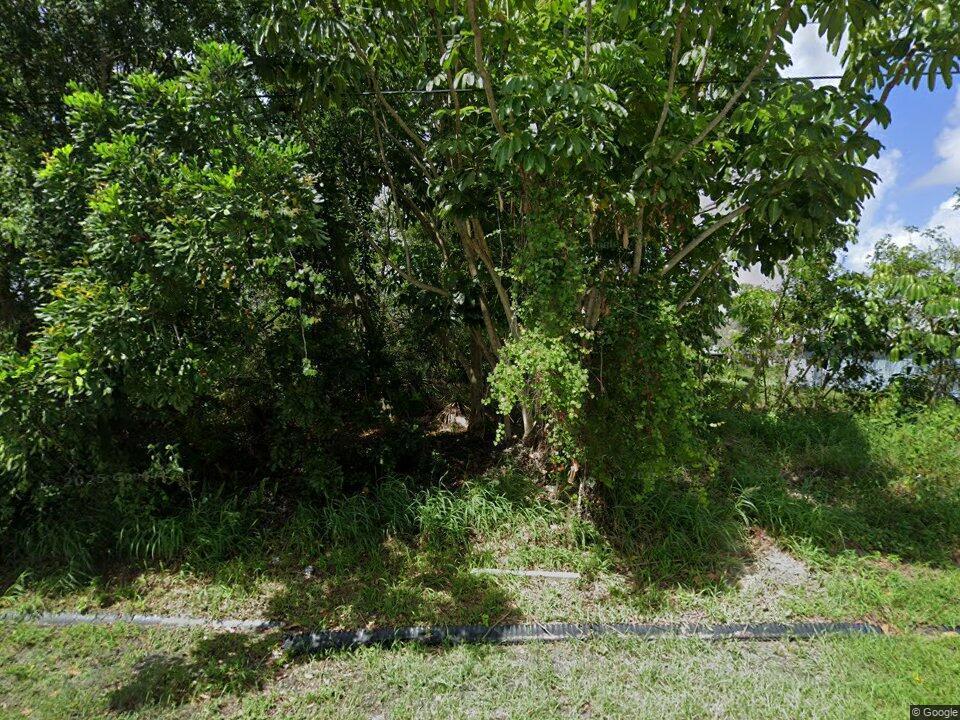 Photo of 512 SW Sansom Lane, Port Saint Lucie, FL 34953 (MLS # B26037200)