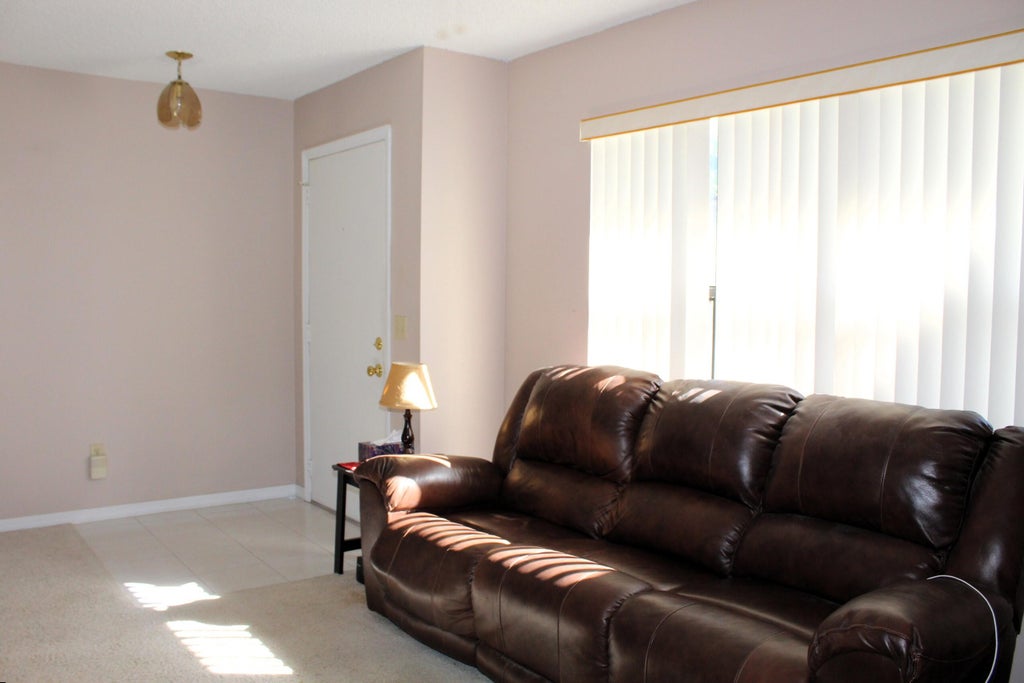 Photo of 2425 SE Rival Avenue, Port Saint Lucie, FL 34952 (MLS # R10937567)