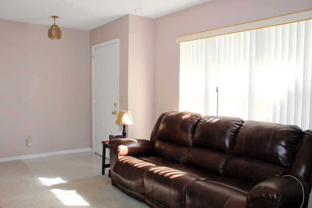 Photo of 2425 SE Rival Avenue, Port Saint Lucie, FL 34952 (MLS # R10937567)