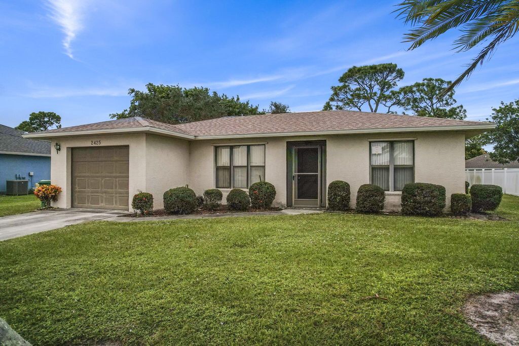 Photo of 2425 SE Rival Avenue, Port Saint Lucie, FL 34952 (MLS # R10937567)