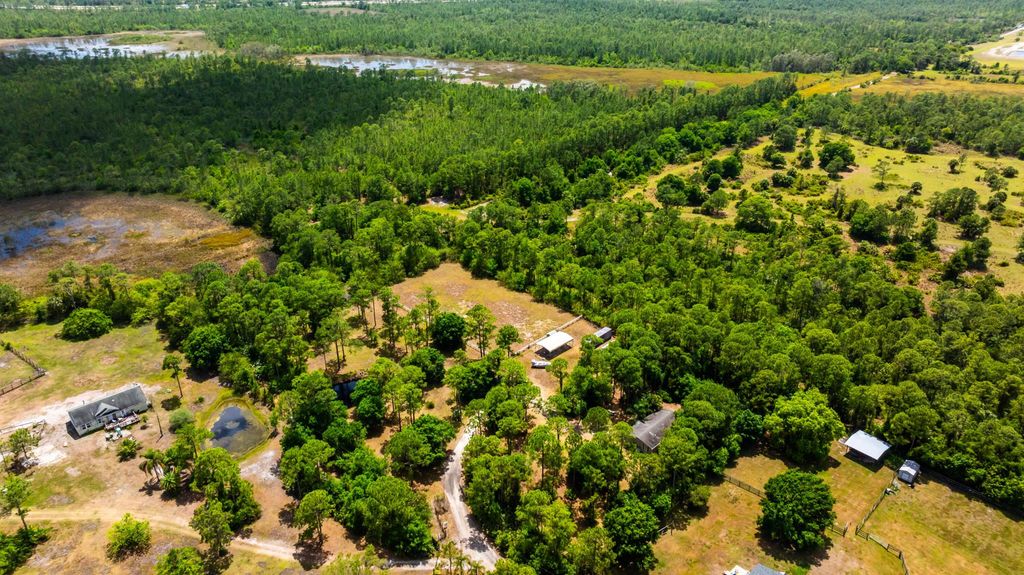 Photo of 7800 SW Rattlesnake Run, Palm City, FL 34990 (MLS # R10981443)