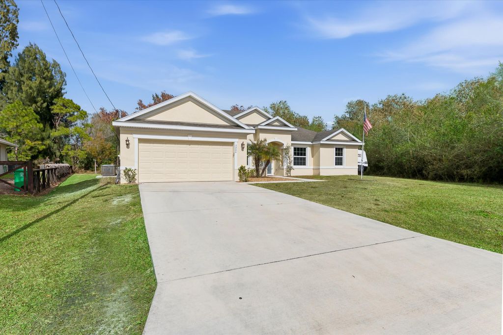 Photo of 5244 NW E Piper Circle, Port Saint Lucie, FL 34986 (MLS # R11164883)