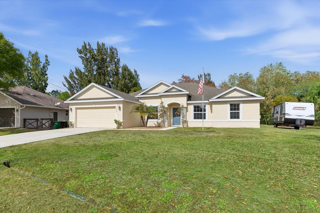 Photo of 5244 NW E Piper Circle, Port Saint Lucie, FL 34986 (MLS # R11164883)