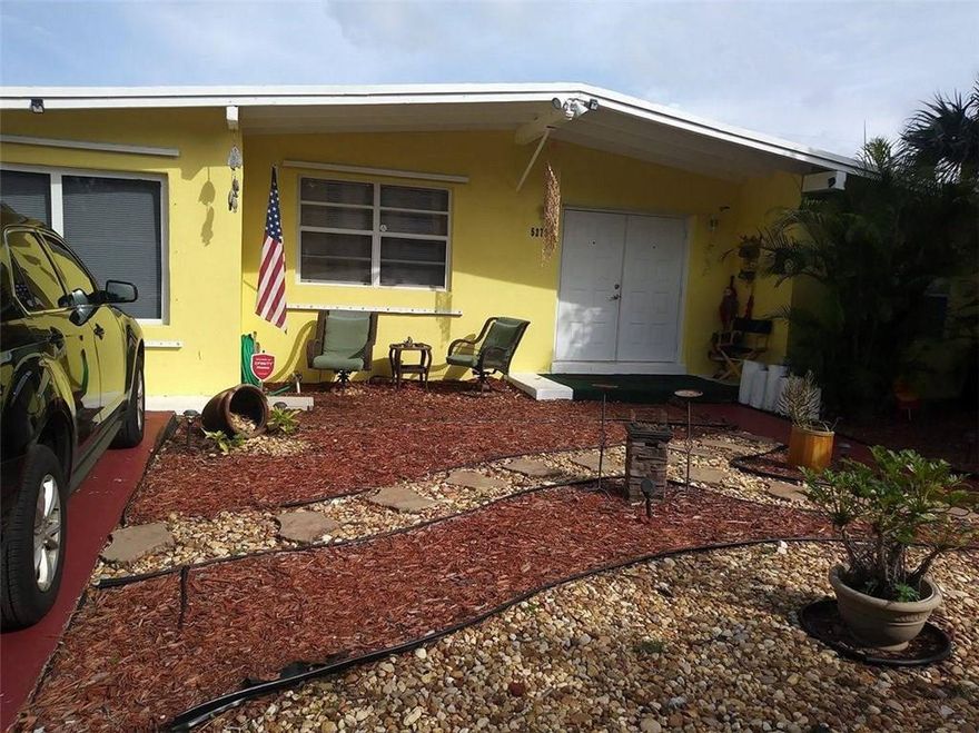 GREAT 4 BED 2 BATH UPGRATED CORNER HOME!!! You must come and see it.  This home has been very well kept. It features an open floor plan, TILED FLOORING, HUGE Back Yard, MAGNIFICENT Deck, FRESHLY PAINTED Exterior, Fruit Tree, partially fenced and Ready to MOVE IN!!***THIS IS NOT A SHORT SALE OR FORECLOSURE*** so bring your offer in.