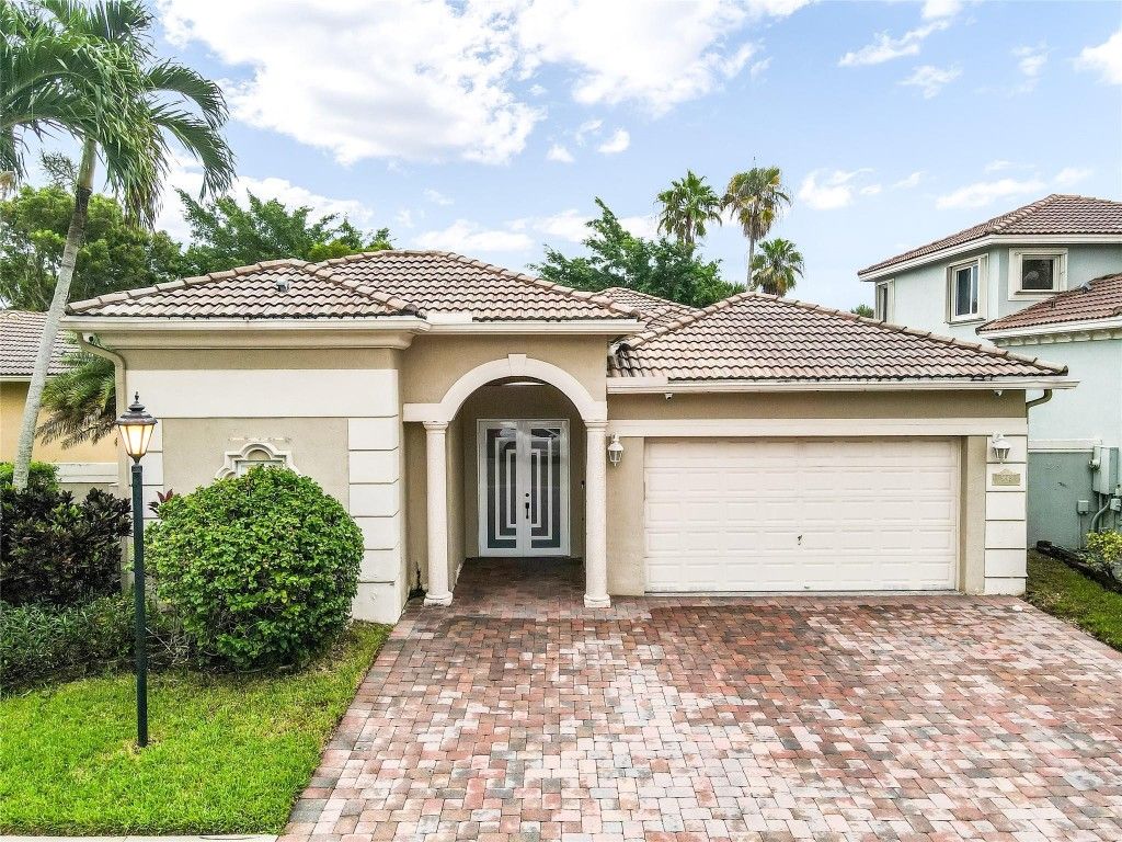 Photo of 5843 NW 123rd Avenue, Coral Springs, FL 33076 (MLS # F10461207)