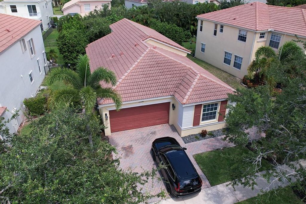 Photo of 11150 SW Springtree Terrace, Port Saint Lucie, FL 34987 (MLS # F10456745)