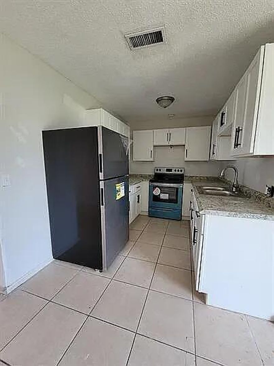 Prime Location Near Phil Foster Park & Riviera Beach Park! Conveniently located just 5 minutes to I-95.This 2-bedroom, 1-bath unit features include:Updated kitchen with newer cabinets and countertops, Tile flooring throughout for easy maintenanceIn-unit washer and dryer.15 mins from Downtown West Palm Beach and PBI Airport. Walkable to Publix. Public transportation near by.Tenant is responsible for electric, water, and cable.Max occupancy 4 persons.Information is deemed reliable but not guaranteed and should be independently verified.