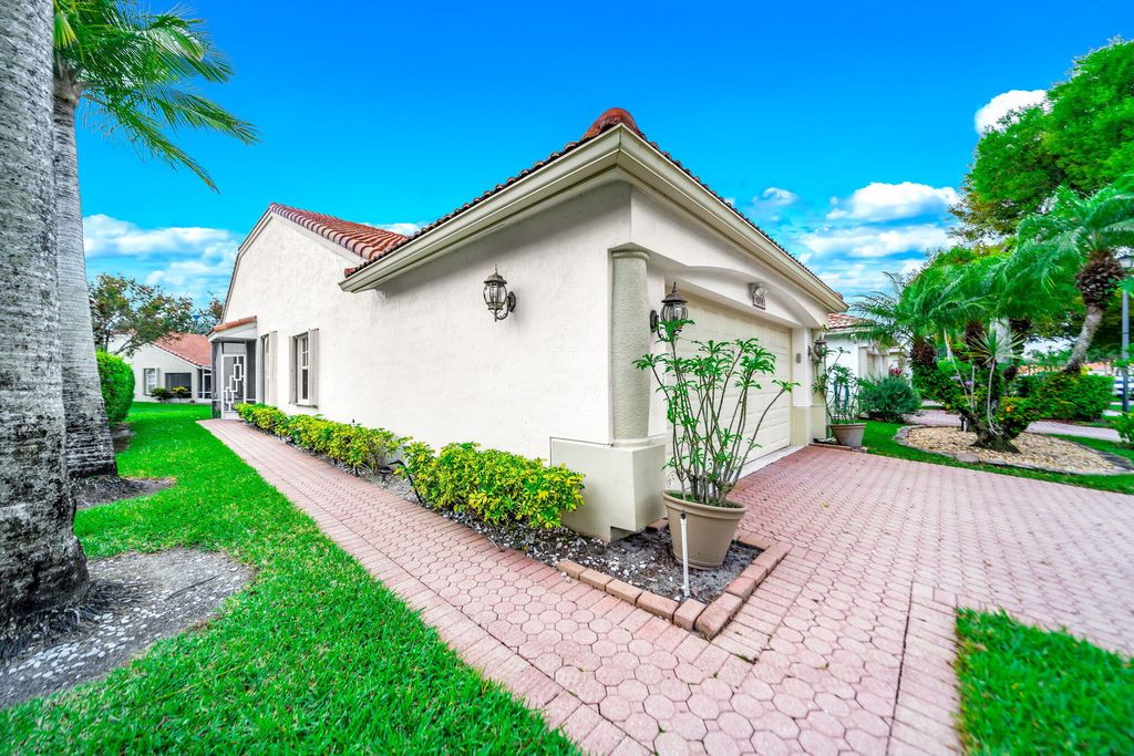 Photo of 6168 Caladium Road, Delray Beach, FL 33484 (MLS # B26012418)