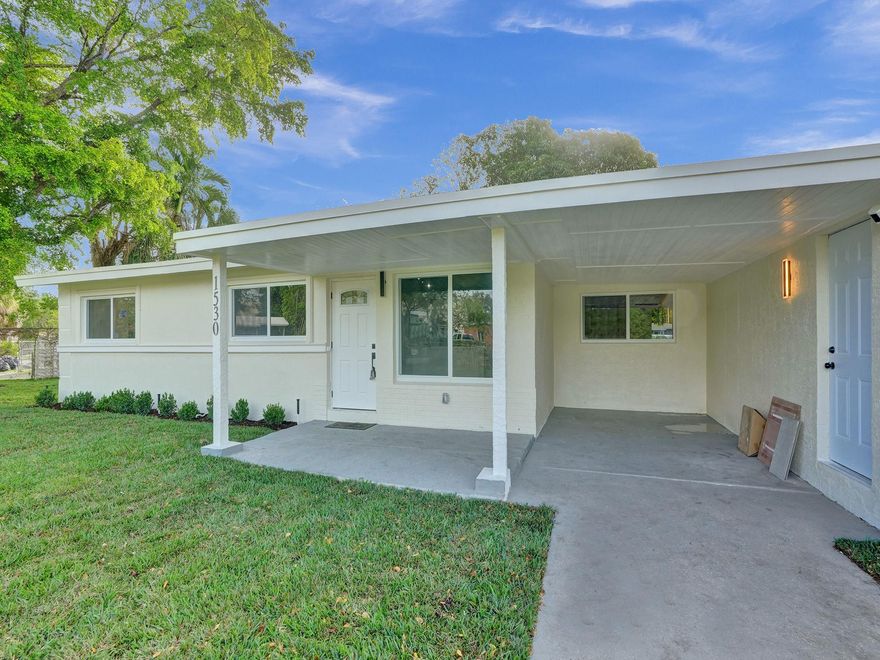 Completely remodeled Home sitting on a huge lot - Front and Back. Exterior and Interior freshly painted. New floors throughout. Brand new Kitchen area, from cabinet woods to black Samsung stainless-steel appliances. Quartz countertops and backsplash. Washer and Dryer brand new. Updated Bathrooms. Electrical rewiring with upgraded panels. 2023 New AC units. New AC Ducts/Vents. New tankless Water Heater. New impact windows and doors. New Lanscape. 2023 New Roof. Perfect for house hack or Airbnb as home has another private entrance. Located 10 minutes from Ft. Lauderdale Beach and major parks.