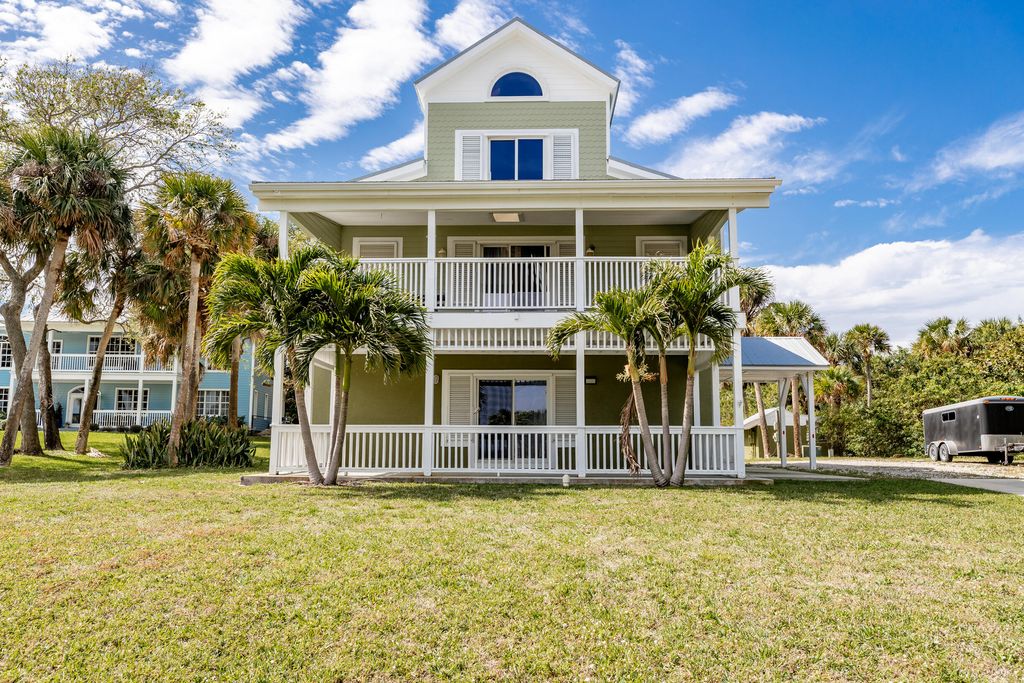 Photo of 13001 S Indian River Drive, Jensen Beach, FL 34957 (MLS # R10959778)