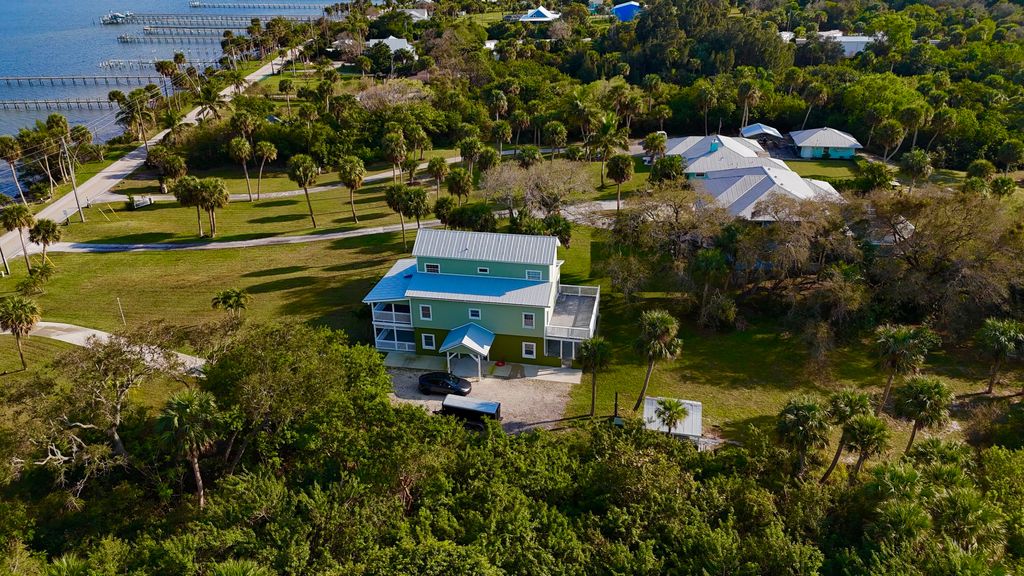 Photo of 13001 S Indian River Drive, Jensen Beach, FL 34957 (MLS # R10959778)