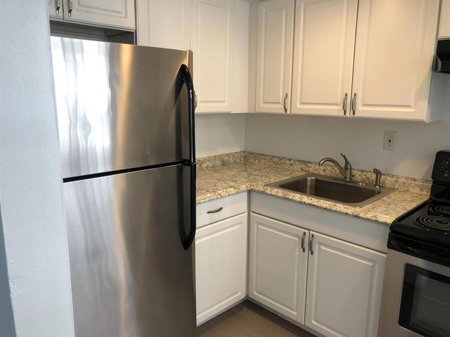 Beautiful first floor 1/1, central ac, parking, great east location.