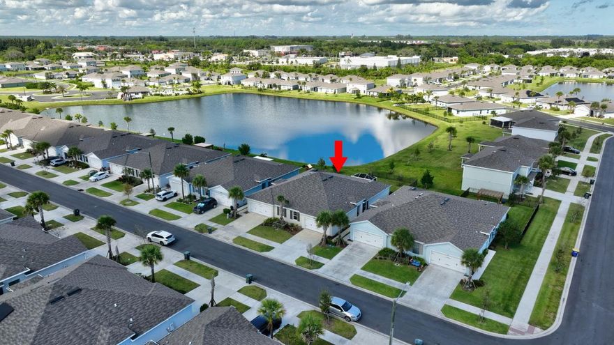 Modern 2023 Lake View Villa with Screened Lanai and Fenced Yard! Welcome to this beautiful maintained 3 bedroom, 2 bathroom and 2 car garage Villa built in 2023. Offering modern comfort, peaceful lake views, and low maintenance Florida Living. Located in a quite, well kept community with lower HOA in Fort Pierce. Within minutes to grocery stores, shopping, restaurants , beautiful beaches and major highways including I-95 and turnpike for an easy commute. This home combines newer construction with an inviting open floor layout. Inside you will find tile flooring throughout, bright and open living space, and a well designed kitchen that flows seamlessly into the dining and living areas, perfect for everyday living and entertaining. The spacious primary suite offers a walk- in closet and a private bath with walk in shower. Step outside to a large screened lanai overlooking the beautiful lake , ideal for morning coffee or evening relaxation. The fully fenced backyard provides privacy and flexibility for pets or outdoor enjoyment!