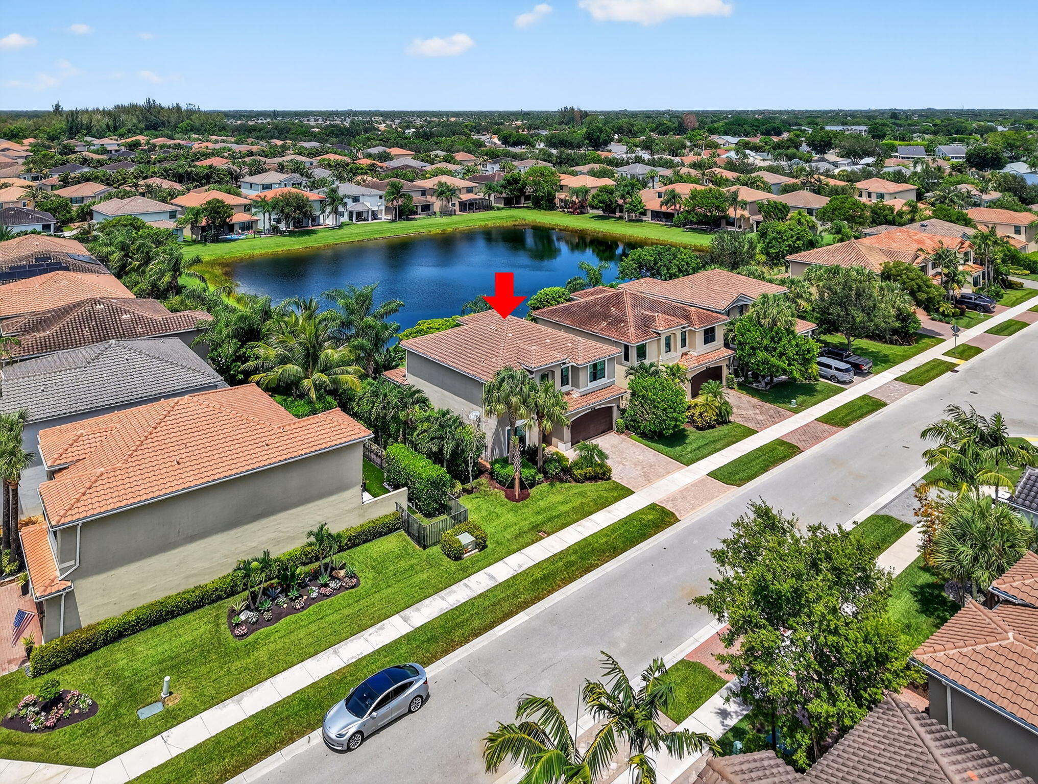 Tuscany North is one of Delray Beach's most desirable gated communities, where elegant living meets modern convenience. Wake up to tranquil lake views in this beautifully upgraded home that has been meticulously maintained. The gourmet kitchen showcases a center island, granite countertops, designer backsplash, & stainless steel appliances--flowing effortlessly into the elegant open-concept living & dining spaces. Enjoy a privately landscaped backyard, thoughtfully designed for relaxation & entertaining, complete with a covered patio perfect for grilling & unwinding in your own serene oasis. A first-floor guest suite with full bath offers comfort for visitors or multigenerational living. Upstairs, retreat to your spacious primary suite featuring luxury vinyl flooring, built-in closets,