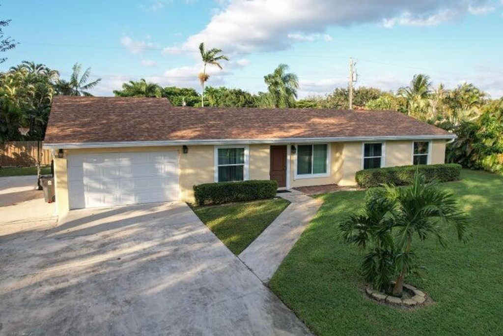 Photo of 9197 Artist Place, Lake Worth, FL 33467 (MLS # R11048170)