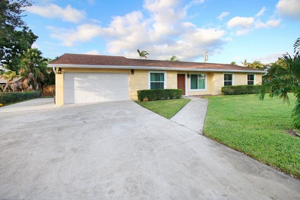 Photo of 9197 Artist Place, Lake Worth, FL 33467 (MLS # R11048170)
