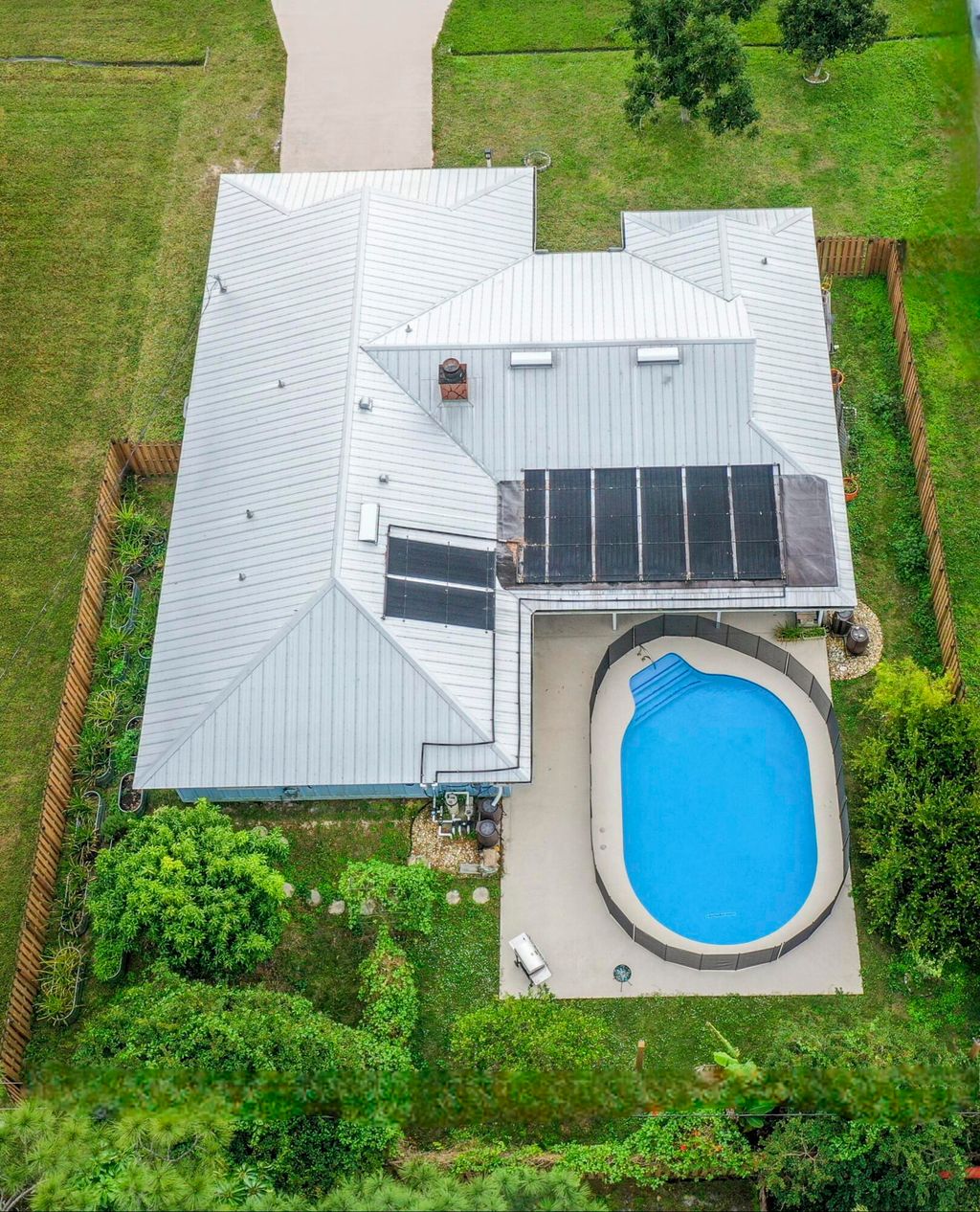 Photo of 773 SE Hollahan Avenue, Port Saint Lucie, FL 34983 (MLS # R10945147)