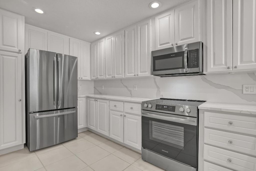 Photo of 115 Soriano Drive, Jupiter, FL 33458 (MLS # R10979658)