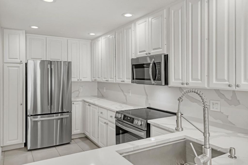 Photo of 115 Soriano Drive, Jupiter, FL 33458 (MLS # R10979658)