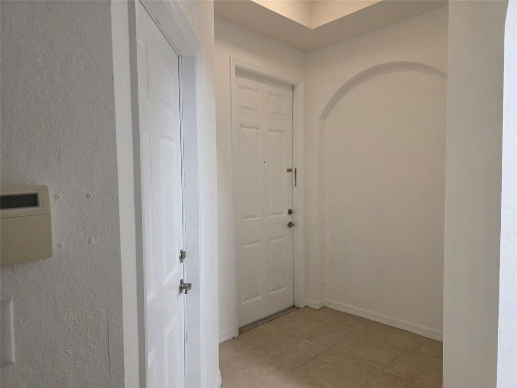 Photo of 960 Pipers Cay Drive #960, West Palm Beach, FL 33415 (MLS # F10527145)