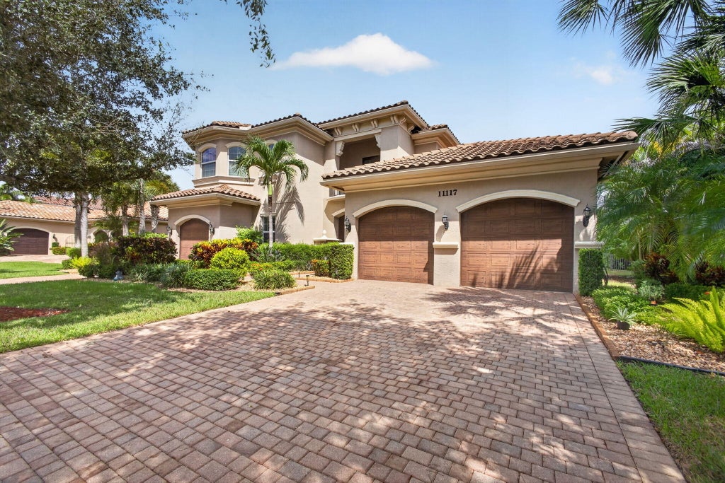 Photo of 11117 Lynwood Palm Way, Palm Beach Gardens, FL 33412 (MLS # B26077381)