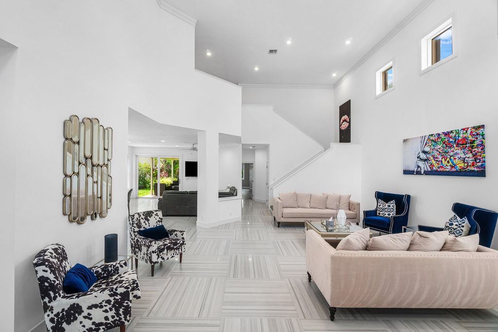Photo of 2404 NW 67th Street, Boca Raton, FL 33496 (MLS # B26033261)