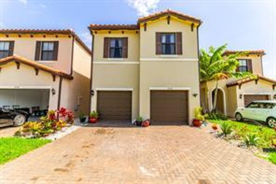 Wake up to the calm of shimmering lake views and savor every evening in this inviting home in Arbor Park's gated, Mediterranean-inspired enclave. Every detail exudes comfort—impact glass for safety, tile floors, and fresh, modern finishes. The heart of the home is the open kitchen—gleaming granite, stainless appliances, and a large island perfect for shared moments. Upstairs, the owner's suite is a peaceful escape with a spa-inspired bath. Outside, the terrace is your private oasis for relaxation or entertaining. With resort-style amenities and a prime location near parks, highways, and all that Palm Beach County offers, this home is a dream come true.