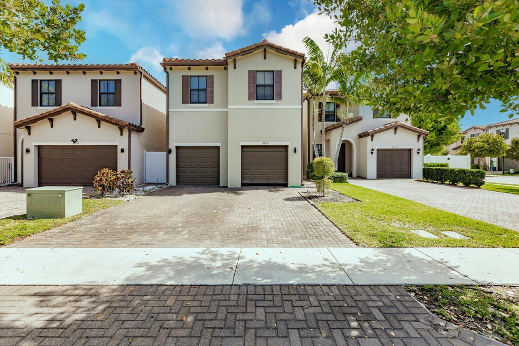 Photo of 6026 Pine Tree Way #6026, Riviera Beach, FL 33410 (MLS # B26016062)